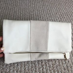 Cream colored Leather and suede stripe clutch